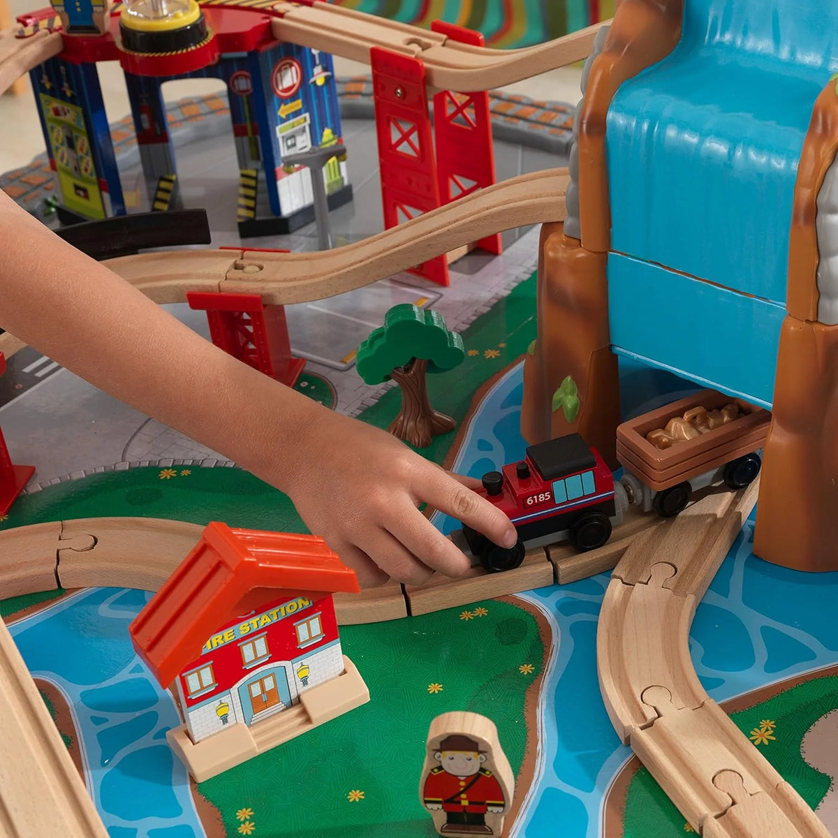 KidKraft Waterfall Mountain Wooden Train and Table Set with Storage Boxes, Railway Circuit with Cars, Helicopter and Plane Toy Children 3+ Years (17850)