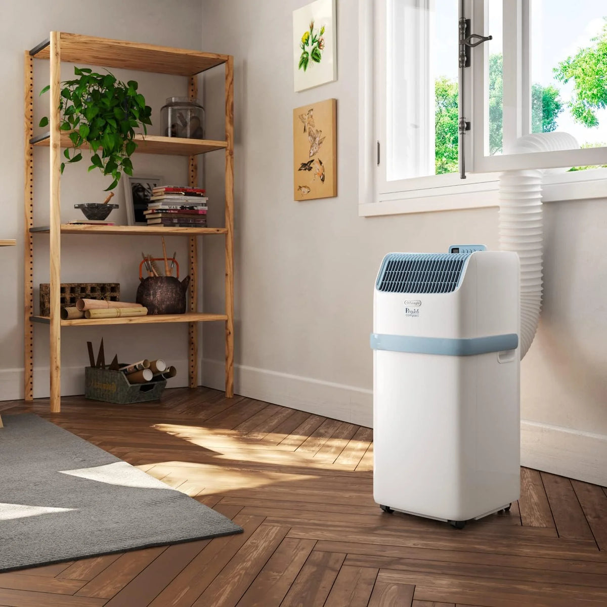 De'Longhi Pinguino Compact ES72 YOUNG, Modèle 2022, Climatiseur Mobile Silencieux, 8.300 BTU/h, 2,1 kW, 60m3, Gaz R290, Fonction Déshumidificateur, 24 Heures Timer, Classe Énergétique A, Blanc